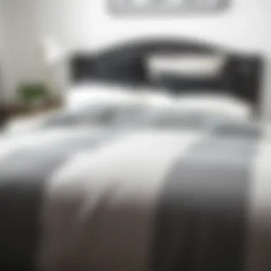 Versatile gray, black, and white king comforter set on a neatly made bed