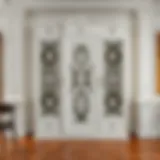 Elegant white wooden cabinet featuring intricate door design