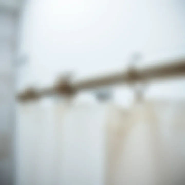 Elegant silver shower curtain rod with decorative finials